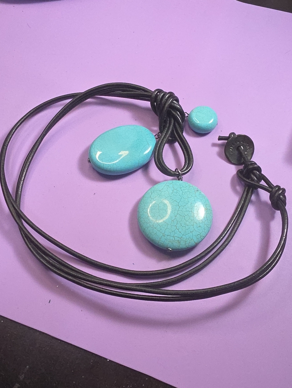 Protasis Branded Leather Cord Necklace with Metal Disk
